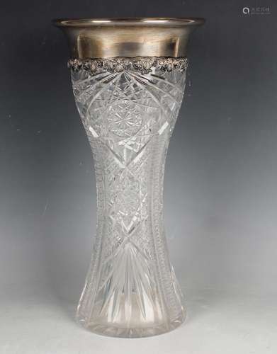 A George V cut glass waisted vase, the silver mounted flared...