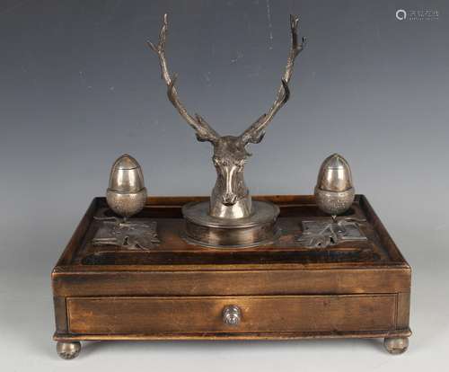 A late Victorian silver mounted walnut inkstandish, the cent...