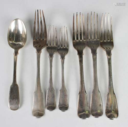 A George III Irish silver Fiddle pattern table fork and two ...