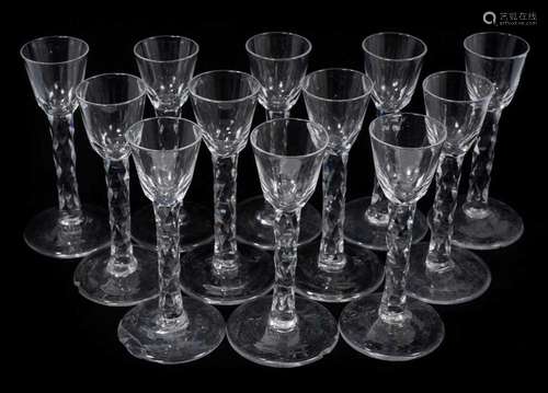 A set of twelve George III wine glasses, each with diamond c...