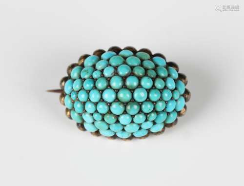 A Victorian turquoise oval brooch of domed form, pave set wi...