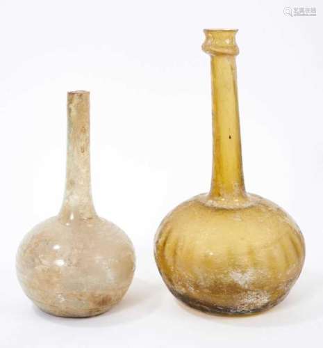 Two Roman glass flasks