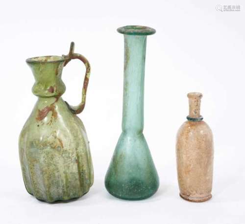 Three Roman glass flasks