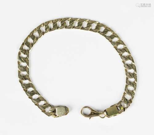 A gold faceted flat curblink bracelet with decorated sides, ...