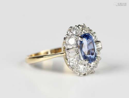 A gold and platinum, sapphire and diamond cluster ring, claw...