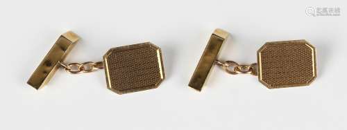 A pair of 9ct gold cufflinks, the cut cornered rectangular f...