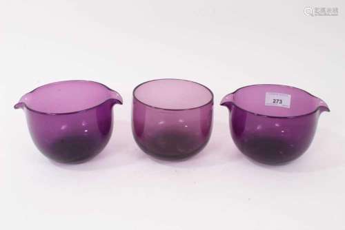 A pair of 19th century amethyst tinted glass double lipped w...
