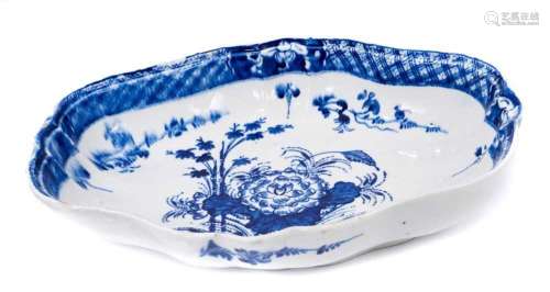 An unusual Bow blue and white dish, painted in Chinese style...