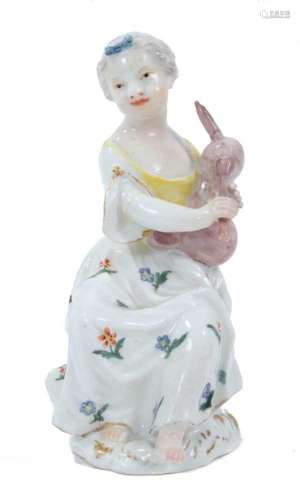 Meissen figure of a young girl, circa 1755, shown seated on ...