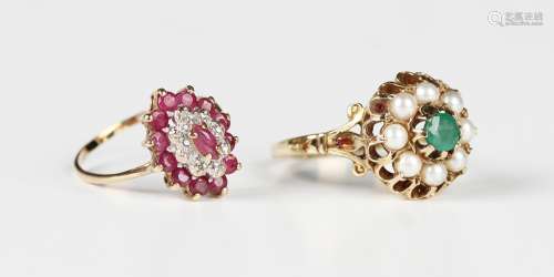A 9ct gold, ruby and diamond marquise shaped cluster ring, r...