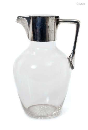 Silver mounted claret jug after a design by Christopher Dres...