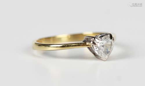 An 18ct gold and diamond single stone ring, mounted with a h...