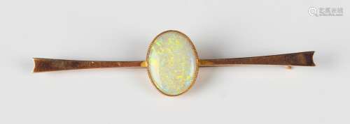 A gold and opal single stone bar brooch, the tapered bar col...