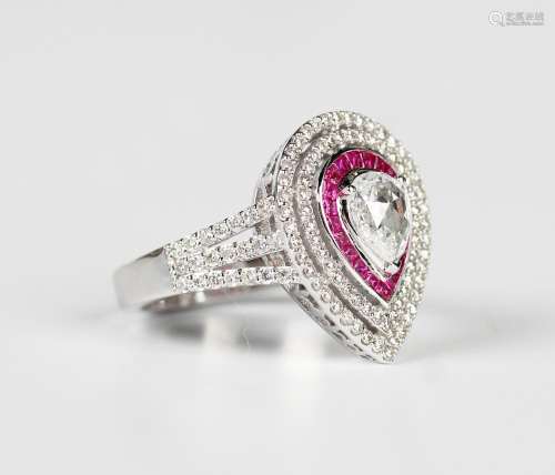 A white gold, ruby and diamond pear shaped cluster ring, cla...