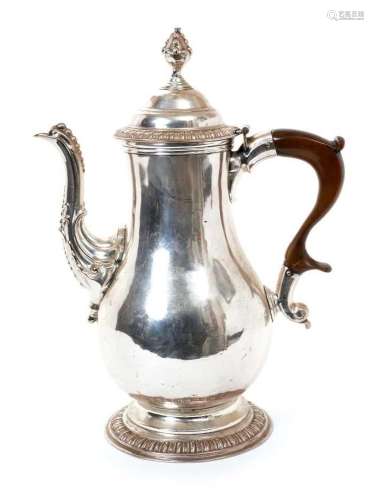 18th century coffee pot of baluster form, the lid surmounted...
