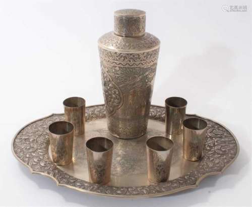 Burmese silver cocktail shaker, six beakers and a tray