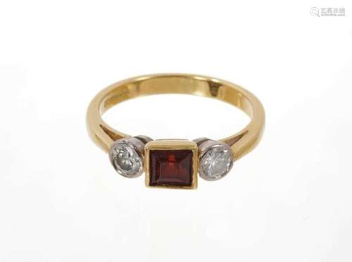 Garnet and diamond three stone ring with a square step cut g...