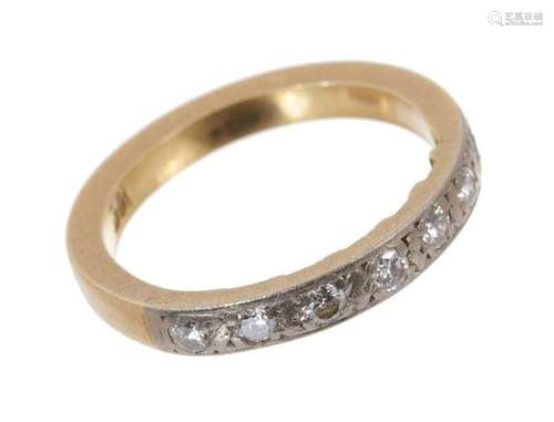 Diamond eternity ring with a half hoop of seven brilliant cu...