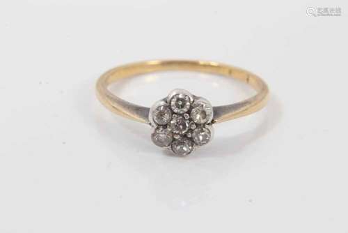 Edwardian diamond cluster ring with a flower head cluster of...