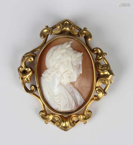 A Victorian gilt metal mounted oval shell cameo brooch, carv...