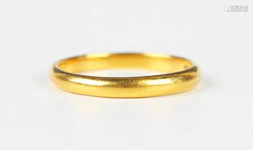 A gold wedding ring, detailed '22ct', weight 4.3g, r...