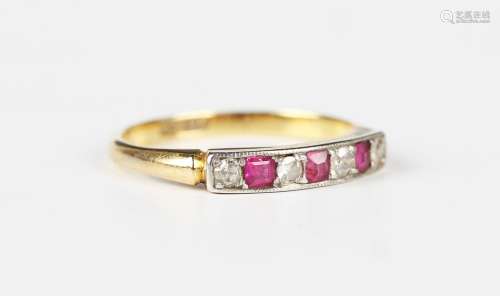 A gold and platinum, ruby and diamond seven stone ring, moun...