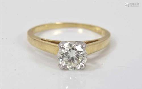 Diamond single stone ring with a round brilliant cut diamond...