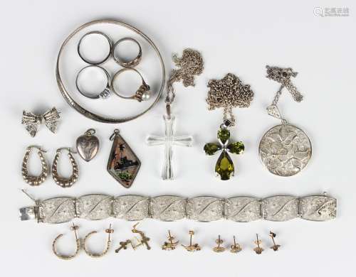 A small group of jewellery, including five pairs of 9ct gold...