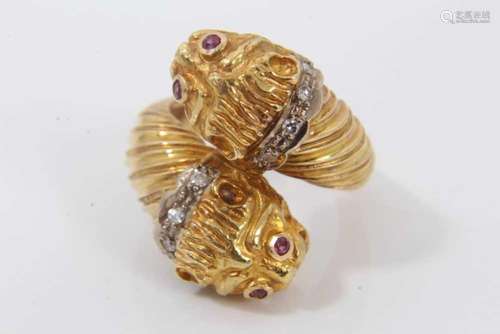 Unusual gold Lions head cross over ring