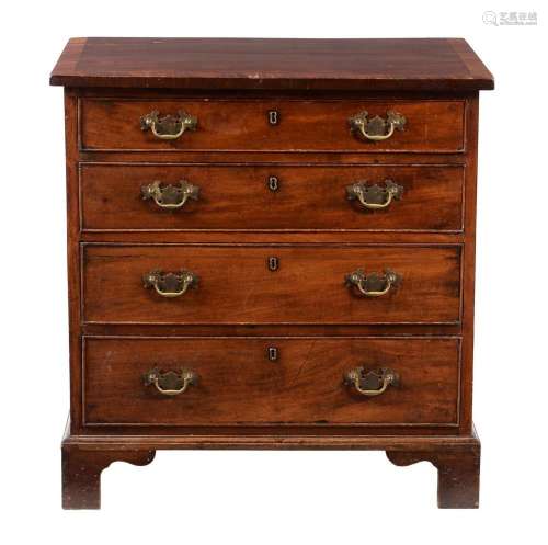 A George III mahogany and crossbanded chest of drawers