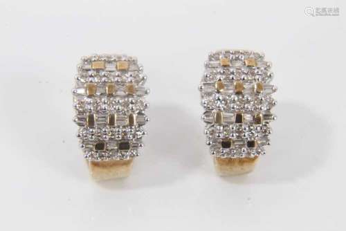 Diamond earrings with brilliant cut and baguette cut diamond...