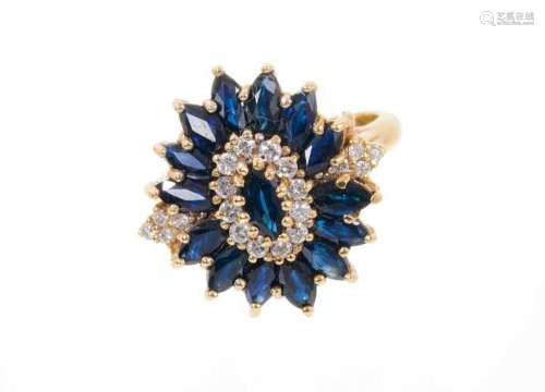 Sapphire and diamond cluster in 18ct gold setting