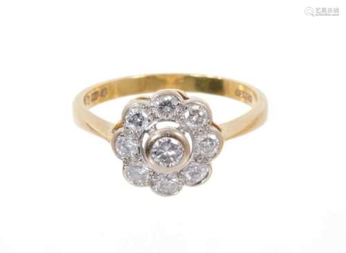 Diamond cluster ring with nine brilliant cut diamonds