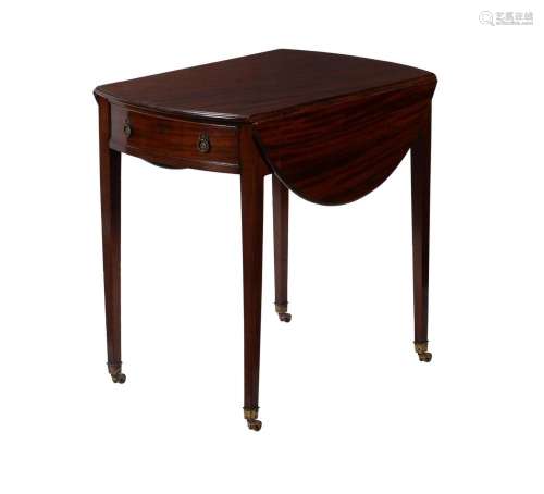 A George III mahogany oval Pembroke table