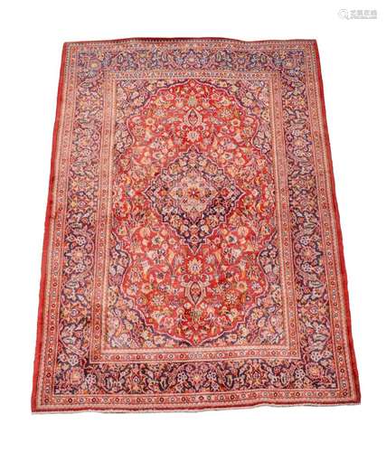 A Tabriz rug