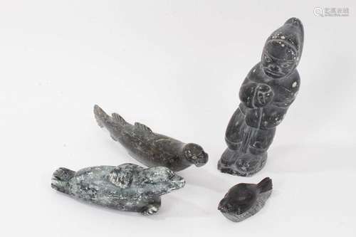 Collection of four Inuit carvings