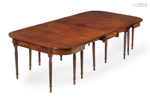 A George III mahogany extending dining table