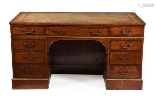 A walnut pedestal desk