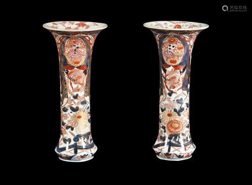 A pair of Japanese Imari trumpet vases