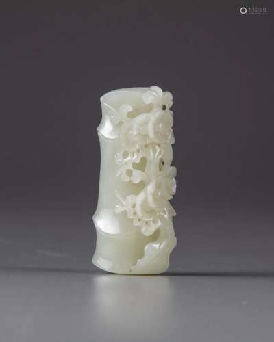A CHINESE WHITE JADE 'PRUNUS AND BAMBOO' CARVING, 20...