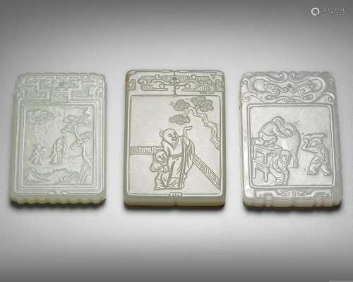 A GROUP OF THREE CHINESE JADE PLAQUES, 20TH CENTURY