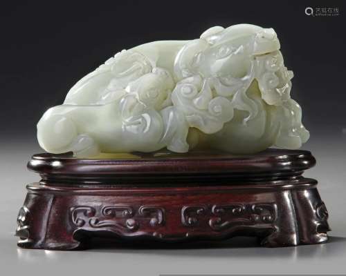 A CHINESE CELADON JADE CARVING OF A WATER BUFFALO