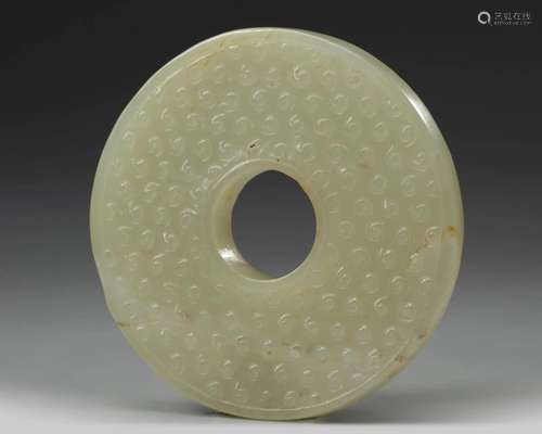 A JADE CARVING OF A BI DISC, QING DYNASTY (1644-1911)