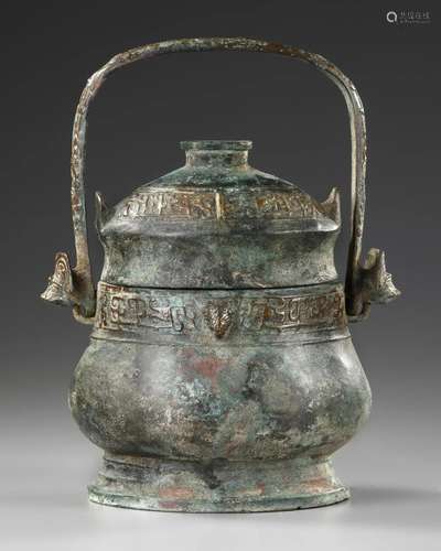 A CHINESE BRONZE RITUAL WINE VESSEL AND COVER, HAN