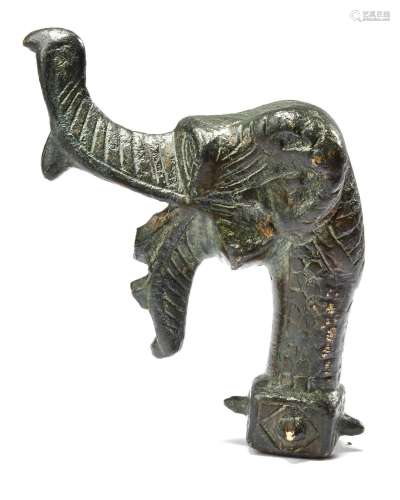 A BRONZE ELEPHANT SPOUT TERMINAL, PERSIA OR CENTRAL