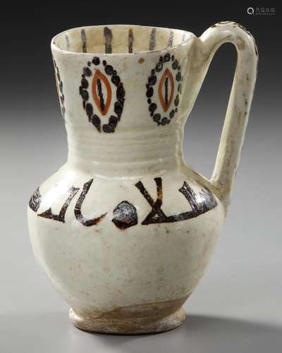 A FINE SLIP-PAINTED POTTERY MUG, PERSIA, 9TH-10TH