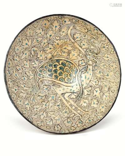 AN ISLAMIC BOWL DEPICTING A BIRD, SULTANABAD WARE,