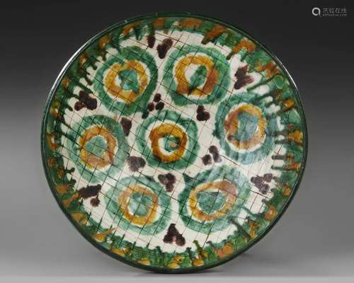 A NISHAPUR TANG SPLASHED BOWL, PERSIA, 10TH-11TH