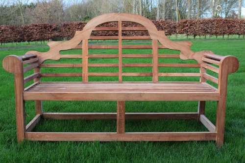 Lutchens style teak bench, typical arched form, 172cm long