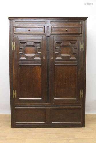 17th century oak geometric moulded standing cupboard